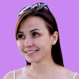 I'm Alena Korsunova and I'm pictured here smiling with long hair and glasses on my head. With a playful gaze looking to the future with great enthusiasm and a desire to do something important and big! The photo is in black, the background is replaced with Purple, this is the style of UNICORN WITNESSES brand (unicornwitnesses.com)